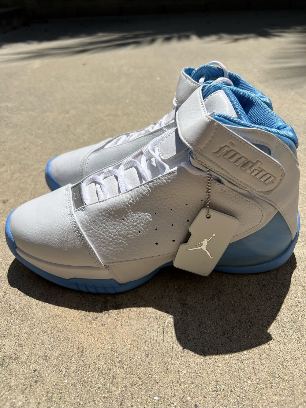 Jordan High-Top Basketball Sneakers in White and Light Blue